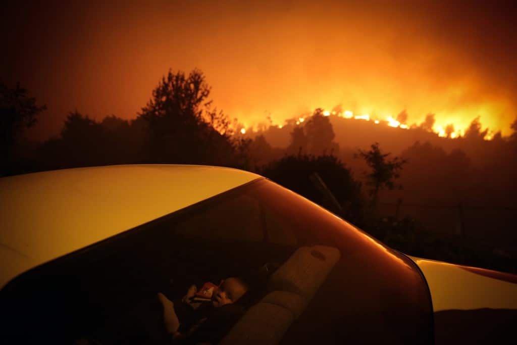 Nuno Andre Ferreira Agência Lusa. «آتش‌سوزی جنگل»، مقام سوم بخش تک‌عکس «اخبار لحظه‌ای» مسابقه عکاسی ورلد پرس فتو 2021
